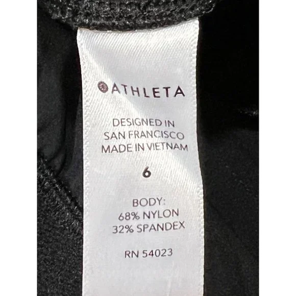 NWT ATHLETA Cosmic Kick Flare Pant Sz 6 Black Lightweight *DEFECT*